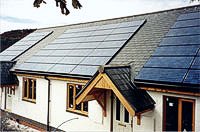 solar panels on a roof producing hot water