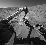 NASA's Spirit robot on Mars, closely inspecting some rocks. Credit: Mars Exploration Rover Mission, JPL, NASA.